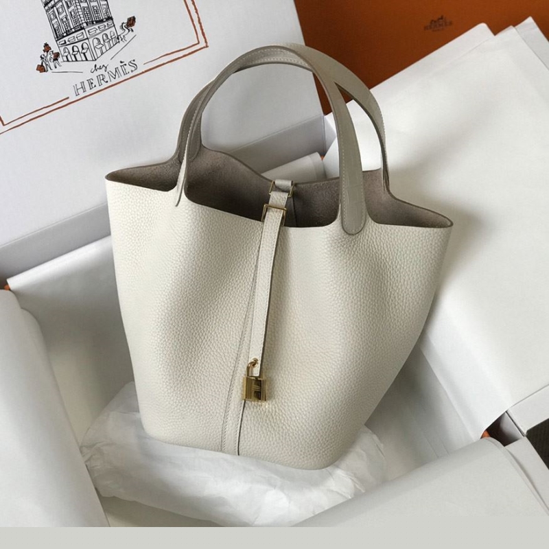 H**mes shopping bags